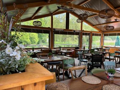 Timber frame with clear PVC walls and roof